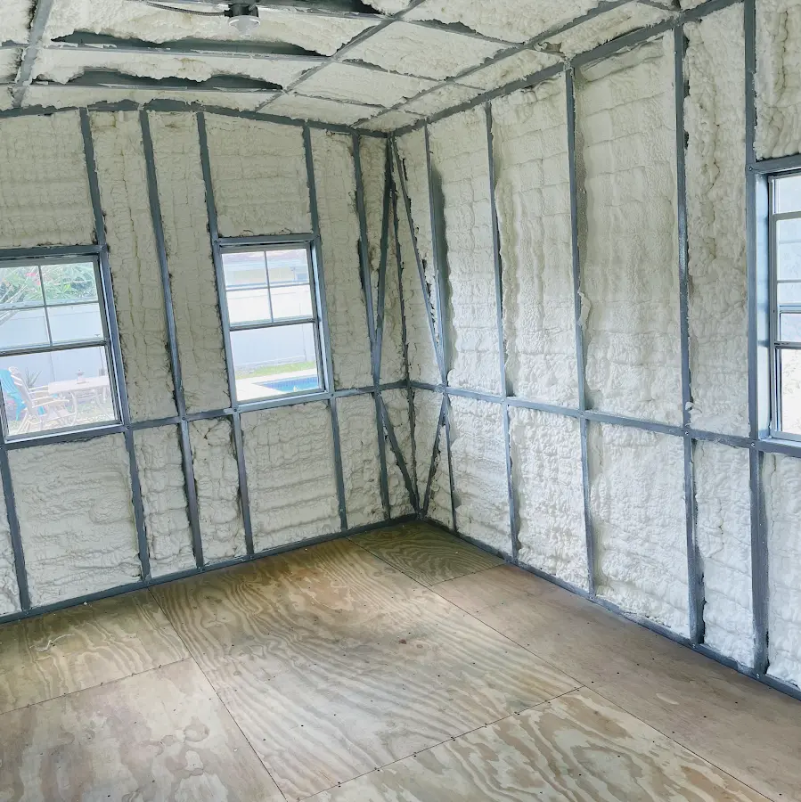 Closed-cell spray foam insulation applied to wall cavities in a residential project in Easton