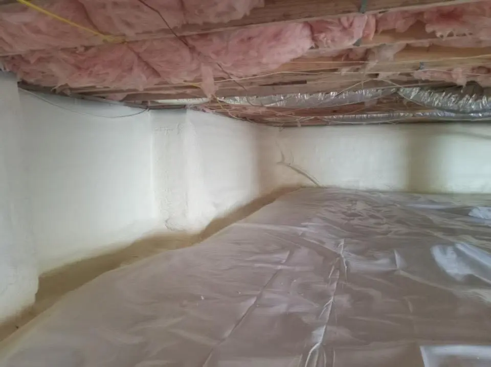 Crawl space encapsulation with closed-cell spray foam for Commercial Roof Restoration in Easton